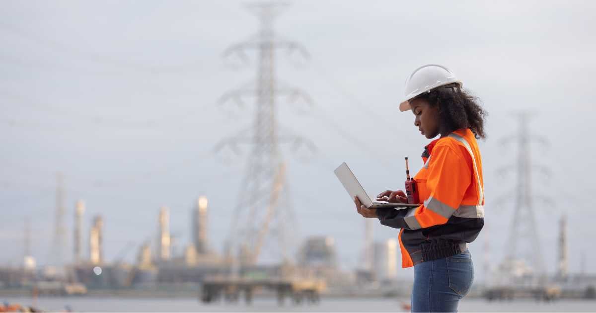 An EPC engineer working against a power plant background An EPC engineer working against a power plant background